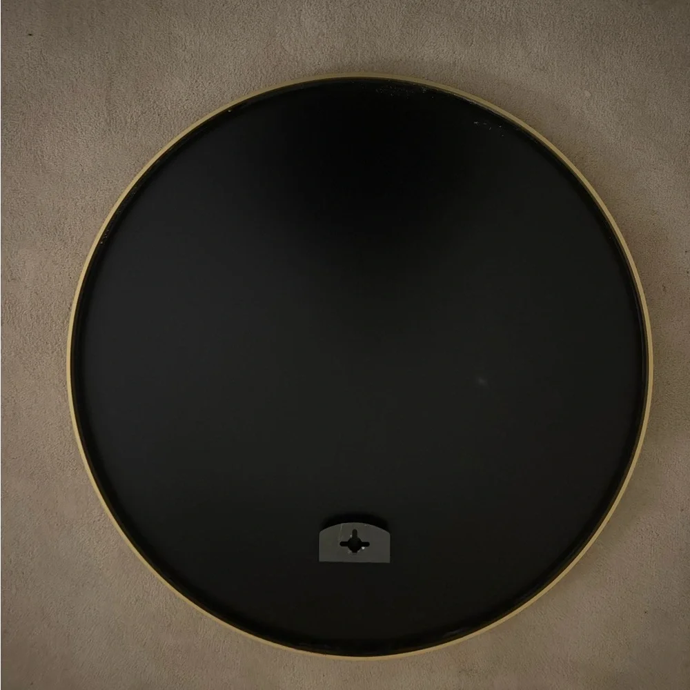 Circular mirror with gold outline medium size